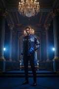 Enter Midnight Ice Kingdom wearing a jacket created for confidence, strength, and purpose. 
This striking design combines a deep-blue galaxy, brilliant jeweled crowns, and elegant sliver royal detail against a dramatic background.
The sleek front offers a sophisticated statement, while the magnificent crow across the back commands attention from ever angle. Perfect for casual outfits, special events, travel, or  matching royal-couple looks.
